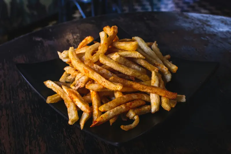 Fries on a dark surface